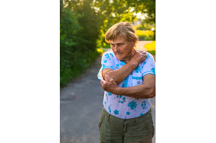 Old woman arm hurts, elbow, a Health & Medical Photo by yanadjana