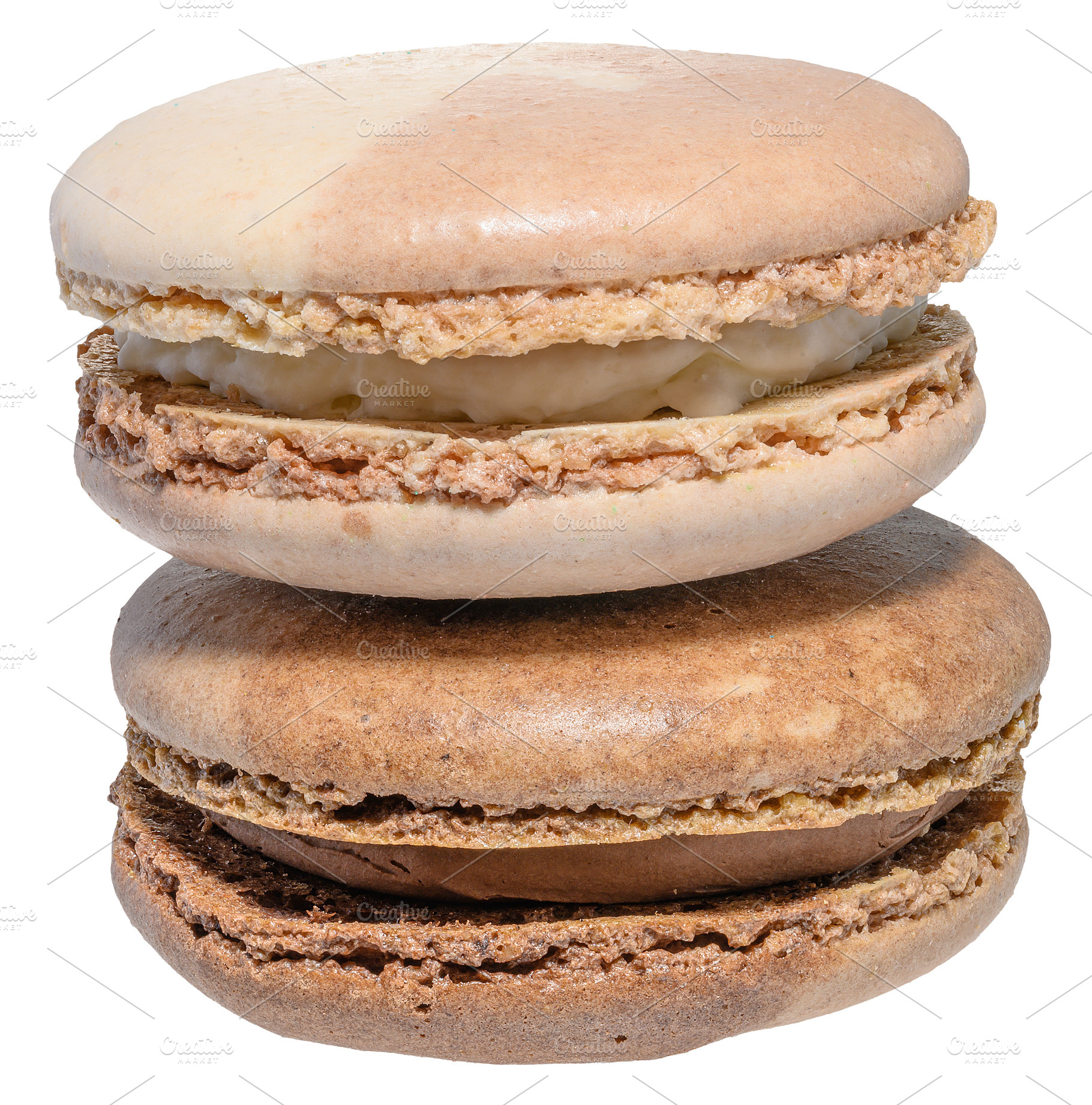 Chocolate macaron on isolated background, close up, a Food & Drink Photo by ndanko
