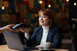 Woman Paying with NFC Technology at, a Photo by Stock Shape