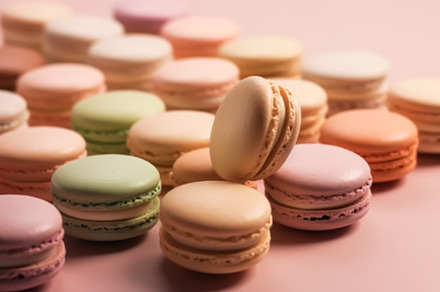 Macaroons on cream pastel background, chic cafe dessert, sweet f, a Food & Drink Photo by Anneleven