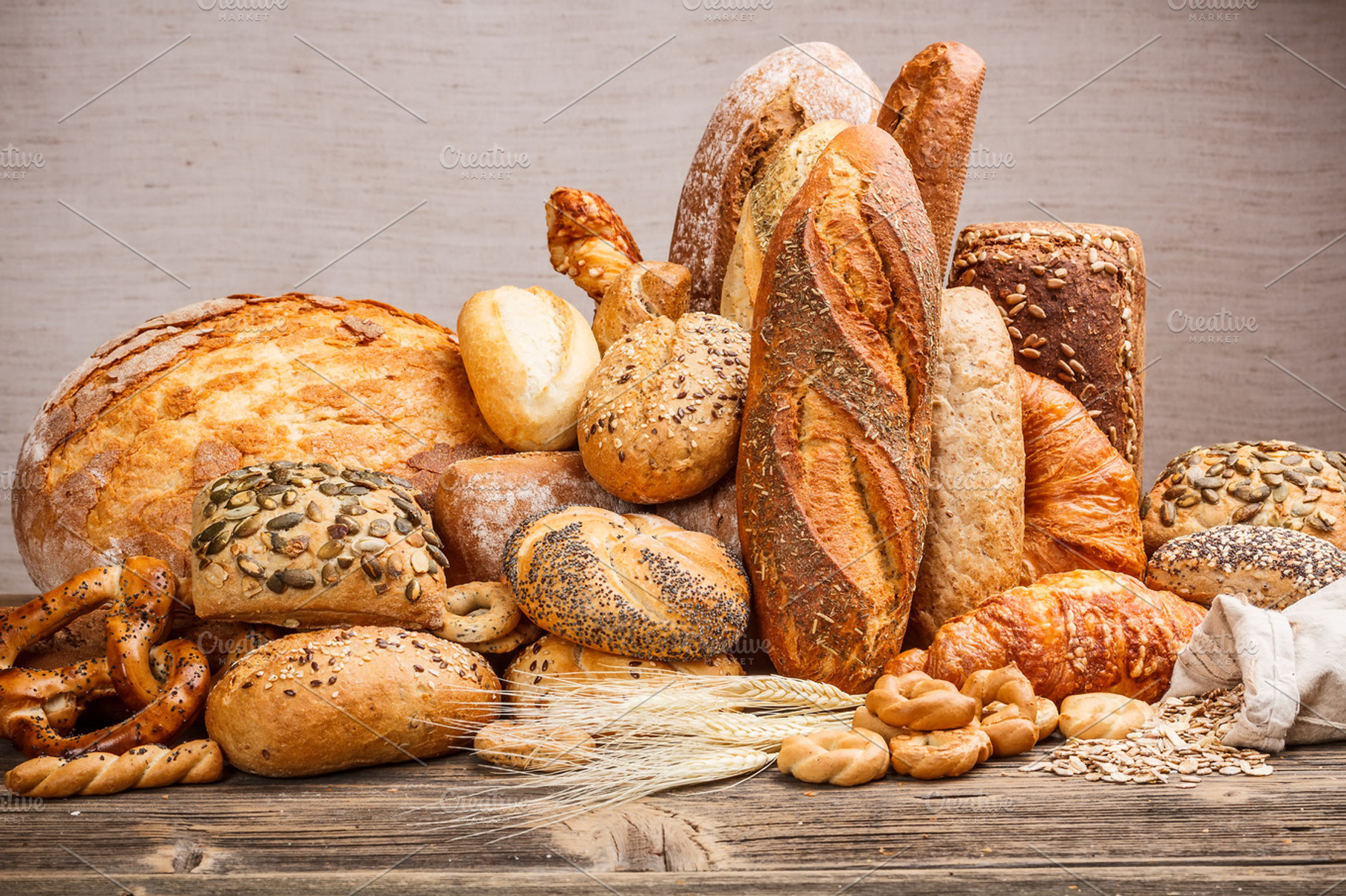 Variety of bread containing assortment, background, and baguette