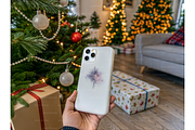 Festive Mobile Case Mockup near Tree, a Product Mockup by MockupWizard (Thumbnail 4 of 5)