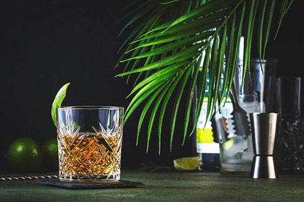 White negroni, alcoholic cocktail with dry gin, white vermouth a, a Food & Drink Photo by 5PH