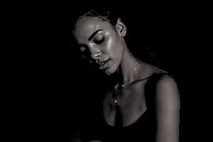 Adult pianist performing at the piano over black background, an Arts & Entertainment Photo by DanFLCreativo