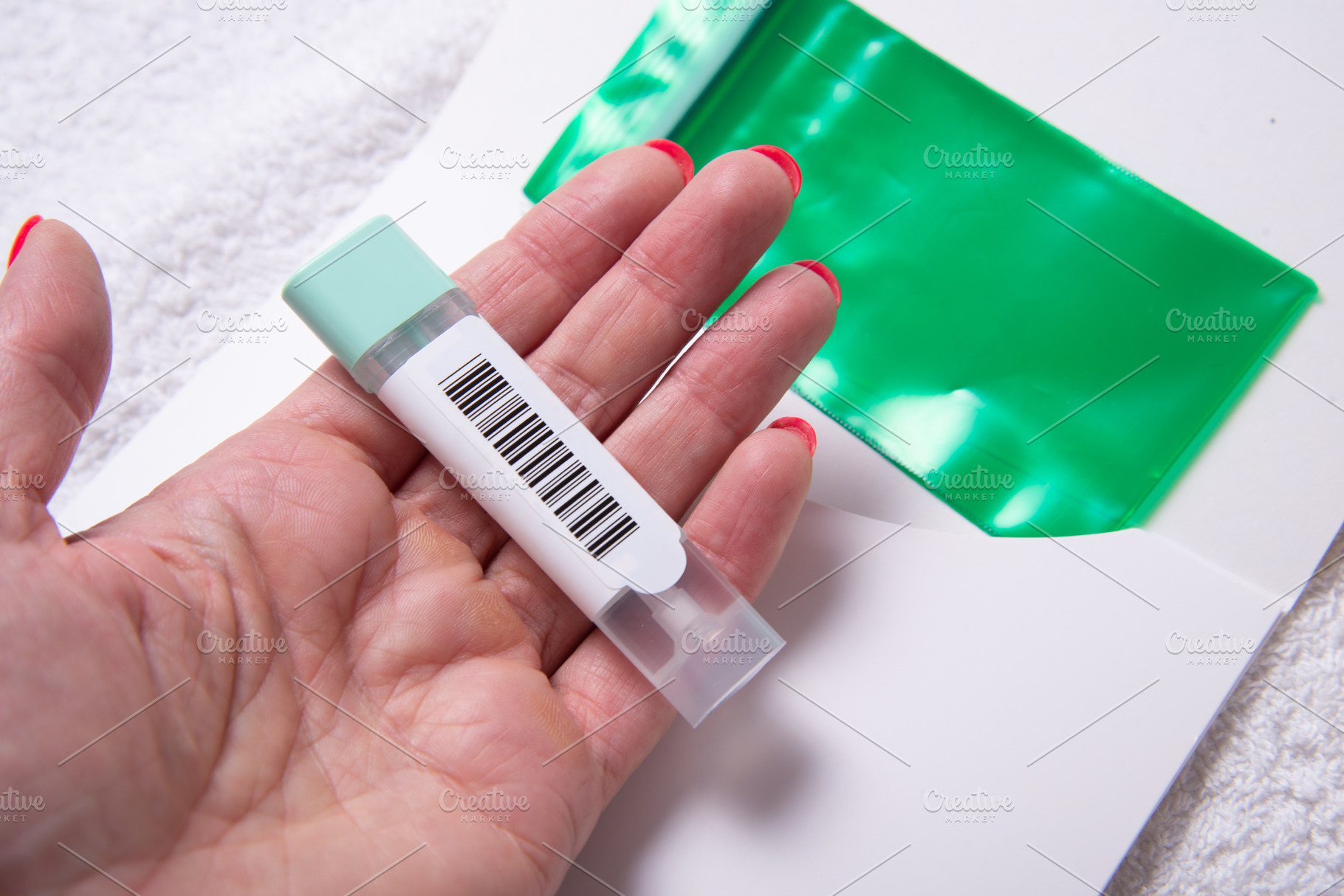 Woman Holding Stool Collection Tube for Colon Cancer Screening w, a Business Photo by MDBildes