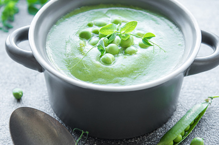 Fresh vegetable soup made of green peas, a Food & Drink Photo by Olena Rudo
