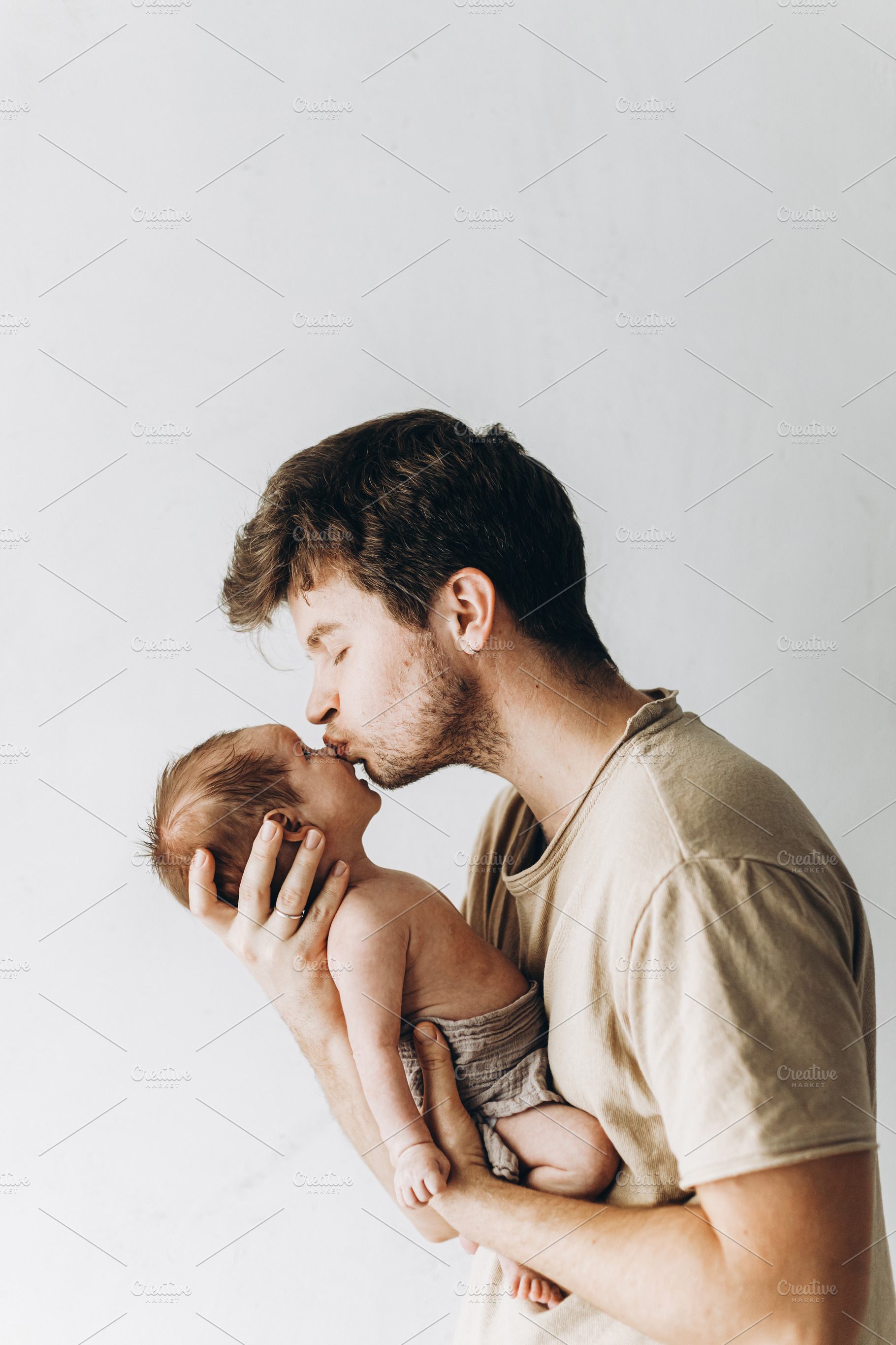 Happy Fathers day!  Stylish father kissing and hugging cute litt, a Person Photo by Sonjachni
