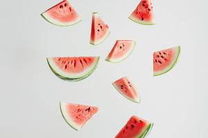 Watermelon slices falling summer fru, a Food & Drink Photo by Pixeness Studio