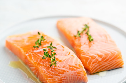 Fresh salmon fillet on a plate for delicious salmon steak.