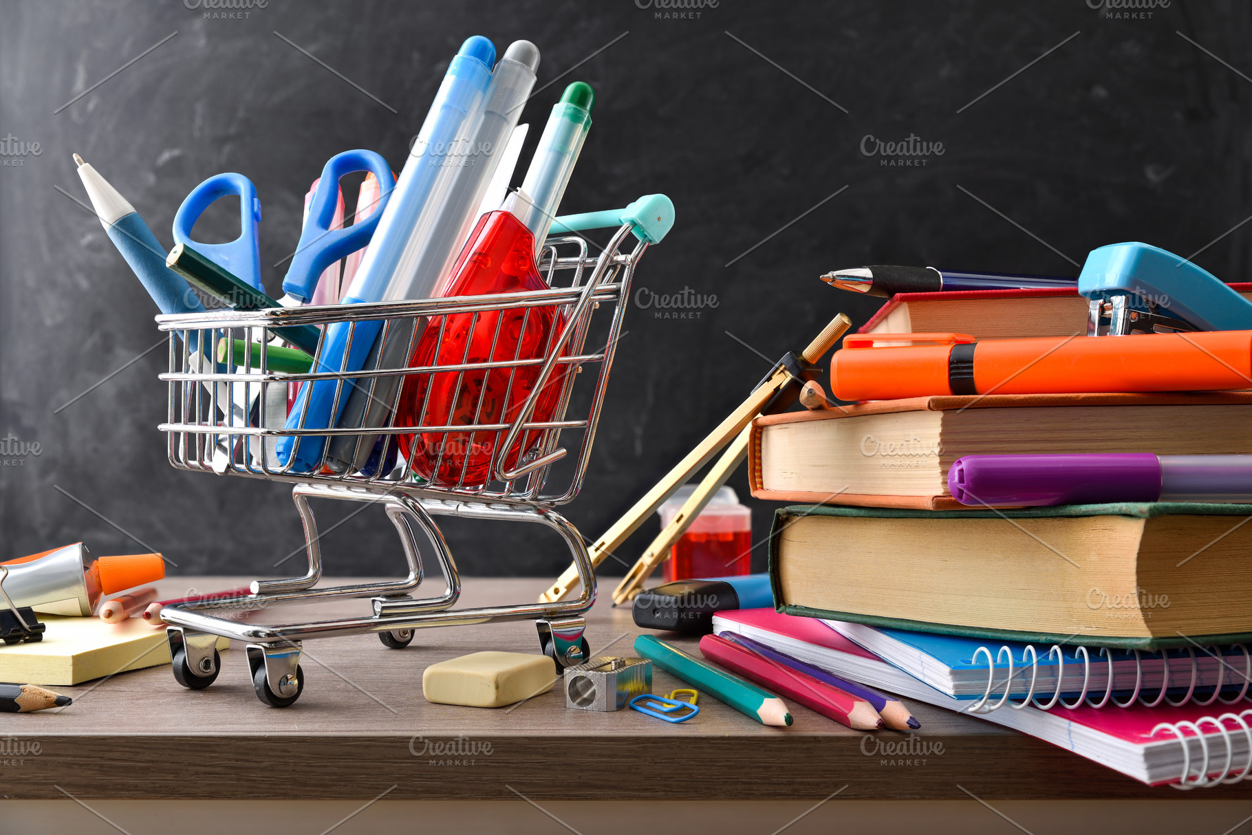 School supplies shopping concept with mini cart full of pencils, a School & Education Photo by Davizro's Market