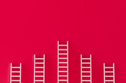 Ladder collection on red background., a Business Photo by Zama Studio