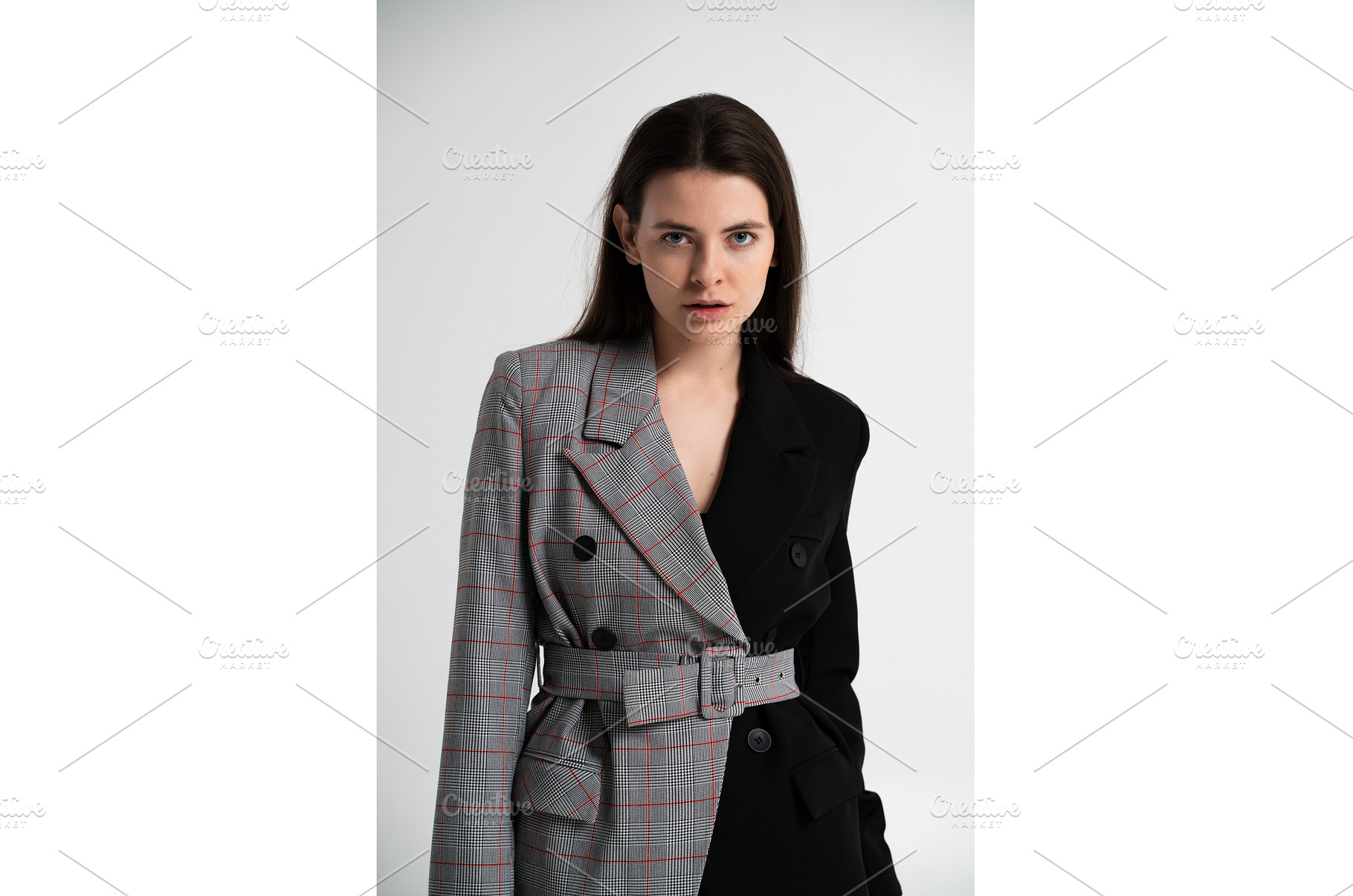 Young woman posing in studio wearing, a Business Photo by volodymyrshtun13795