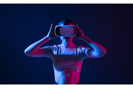 Young pretty female experiences vr featuring woman, girl, and