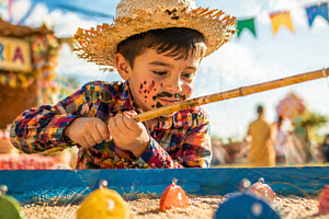 Festa Junina celebration with child, a Photo by Dvoevnore photos