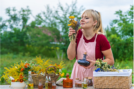 Woman with medicinal herbs and, a Nature Photo by yanadjana