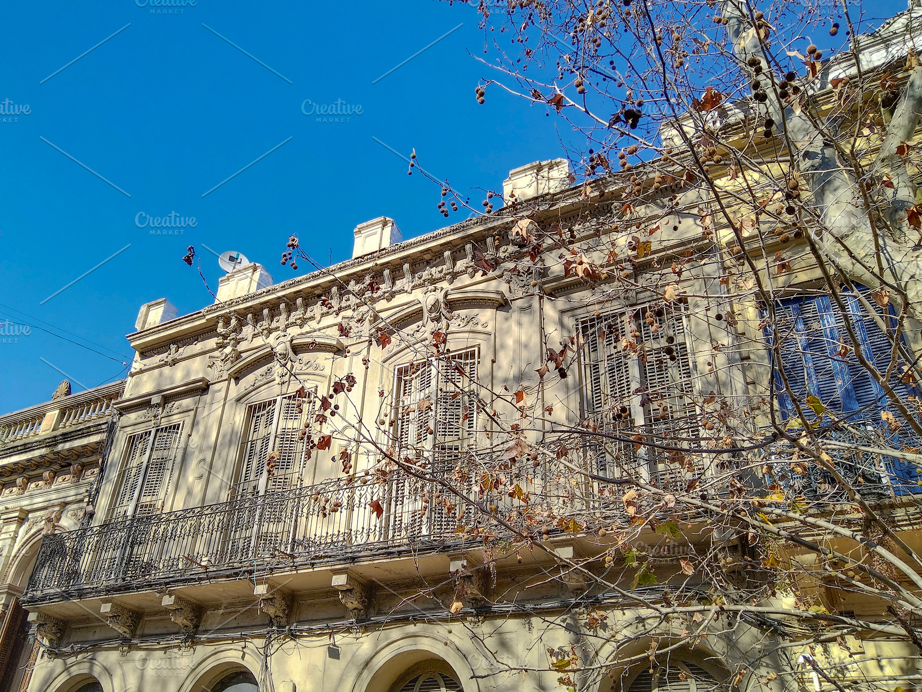Old neoclassical building with iron balconies, an Architecture Photo by DanFLCreativo