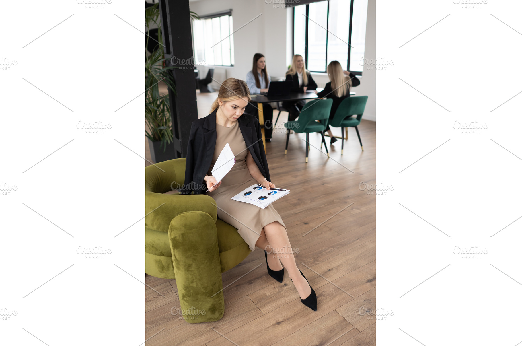 Businesswoman sitting in a cozy, a Business Photo by undrey