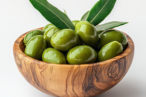 Green olives in wooden bowl with oli, a Food & Drink Photo by Pixeness Studio