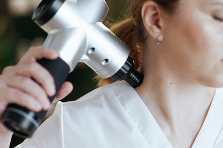 Closeup on female medical massage therapist in spa salon, a Health & Medical Photo by Alliance Images