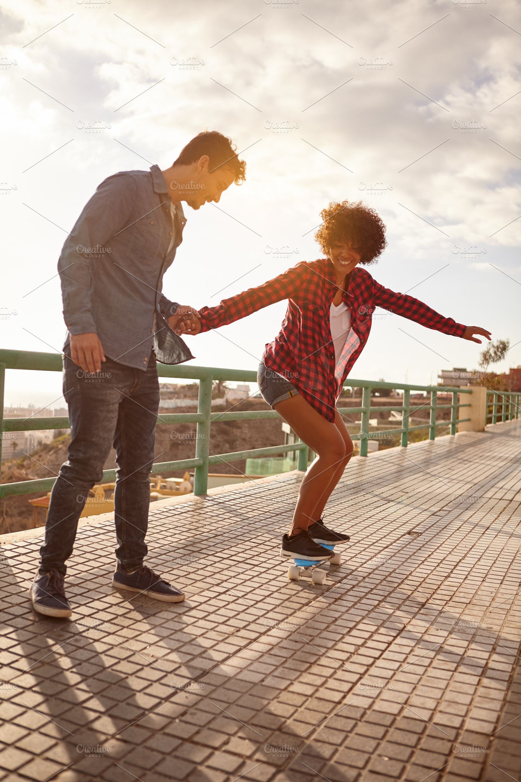 Friends having fun with skateboard stock photo containing girl and skateboard, a Person Photo by Coco Images
