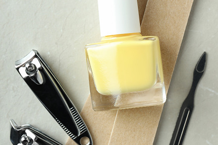 Concept of nail care with manicure accessories on light textured, a Beauty & Fashion Photo by AtlasStudio PRO