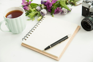 Flat lay desk with tea and flowers stock photo containing flatlays and desk