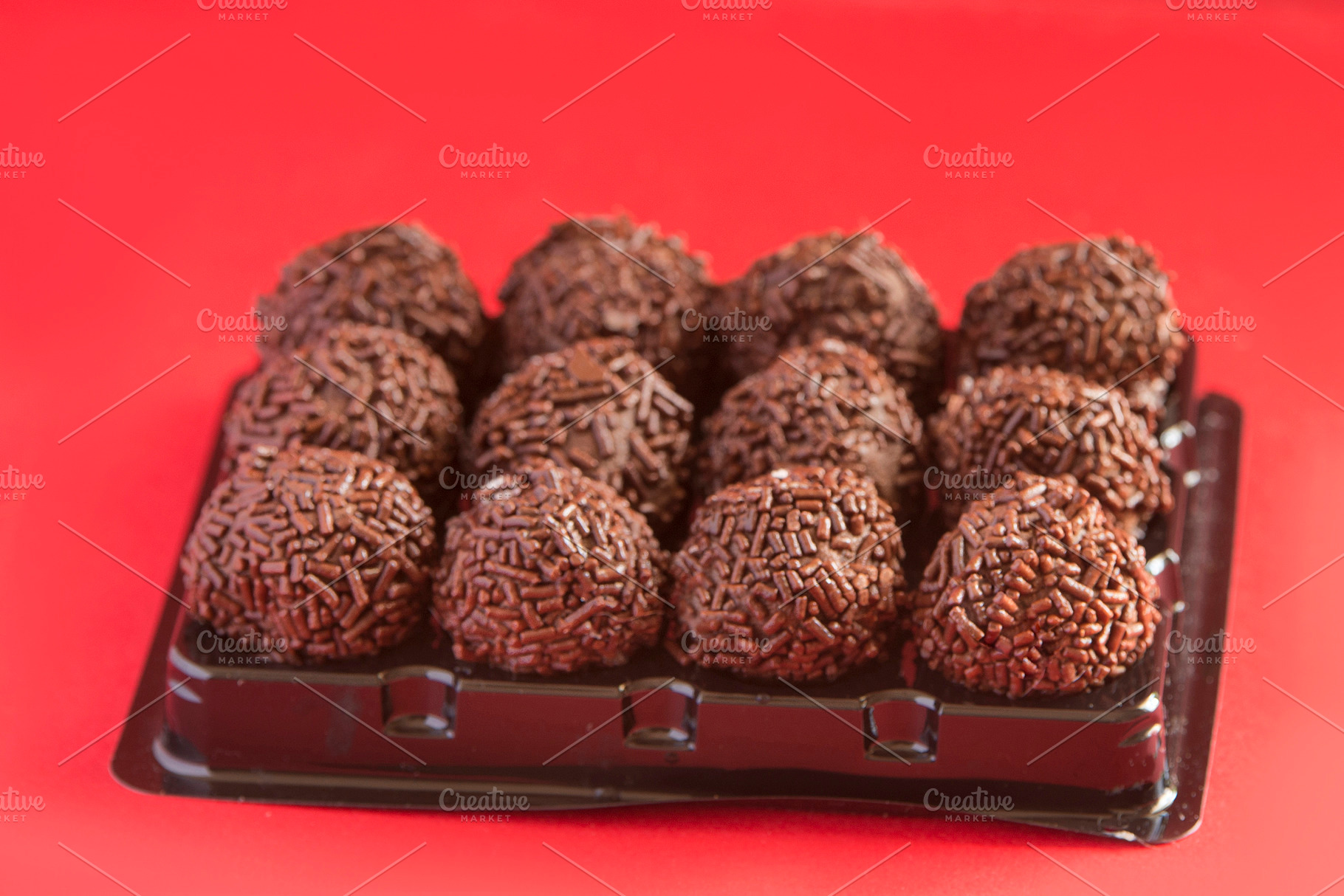 brigadeiro is a typical sweet of Brazilian gastronomy, a Food & Drink Photo by DalaiFood