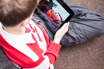 Watching a cartoon on a tablet pc, an Arts & Entertainment Photo by Twin Design