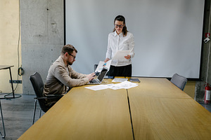 Two office workers in office, a Business Photo by 5max