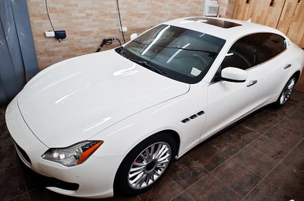 White new luxury sport car in detailing garage., a Transportation Photo by AS photostudio
