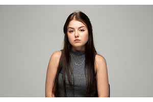 Young brunette woman looking at the, a Person Photo by volodymyrshtun13795