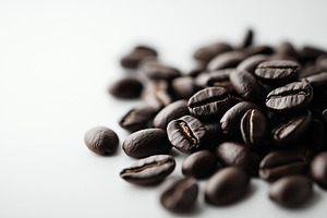 Dark roasted coffee beans arranged, a Food & Drink Photo by MistyDay
