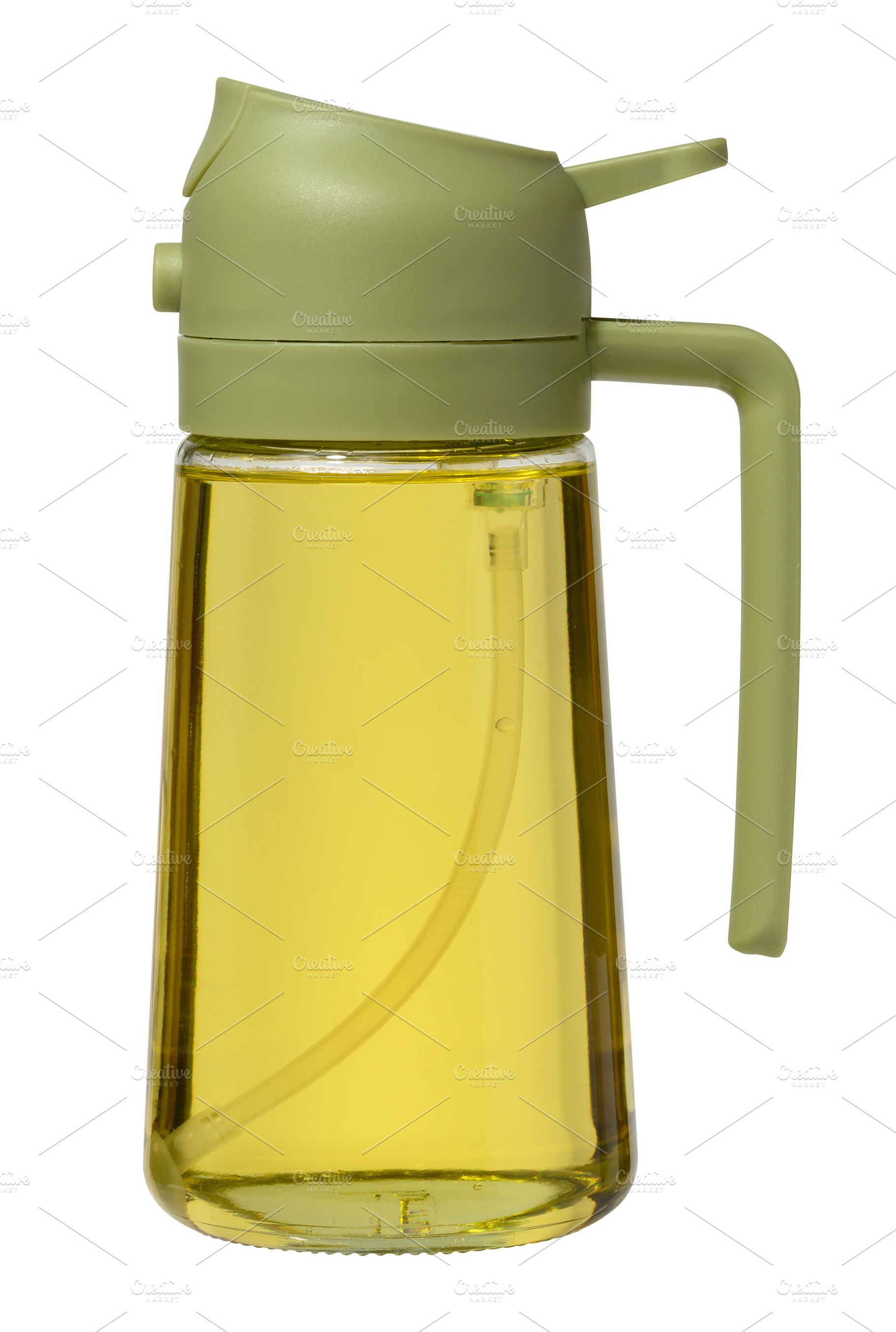 Kitchen bottle dispenser for vegetable oil with green cap on iso, a Food & Drink Photo by ndanko