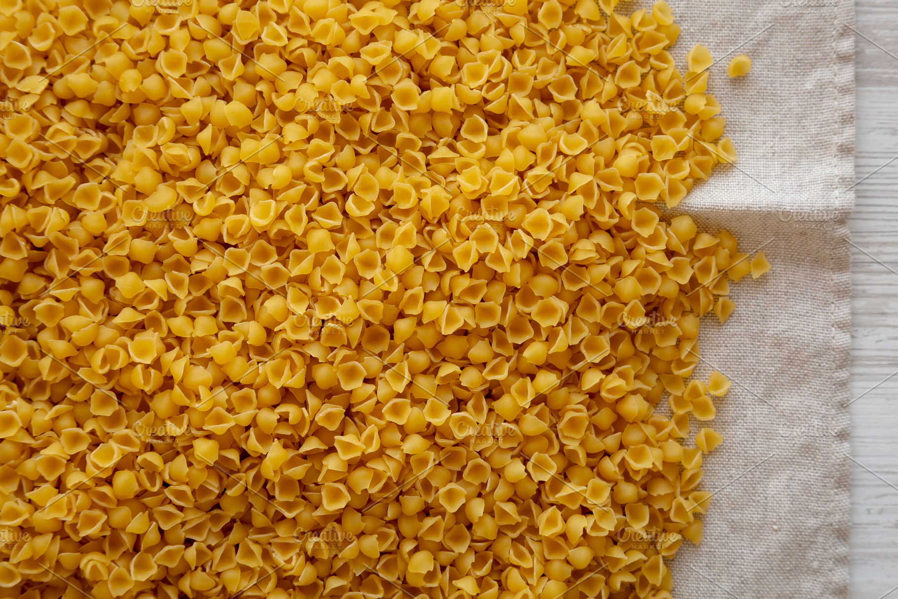 Homemade Perlini Pasta, top view. Flat lay, overhead, from above, a Food & Drink Photo by LiudmylaChuhunova