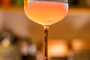 Pink cocktail served in a coupe glass, a Photo by Grafvision photography