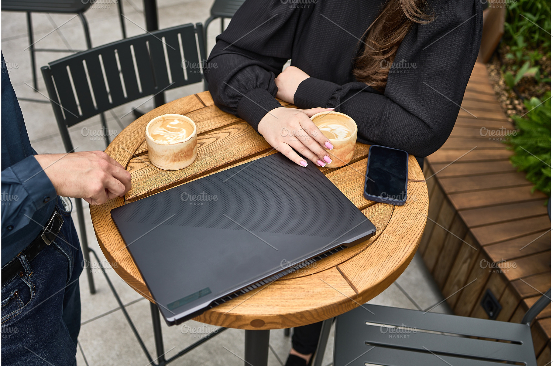 Casual cafe meeting with laptop, a Business Photo by wip3out