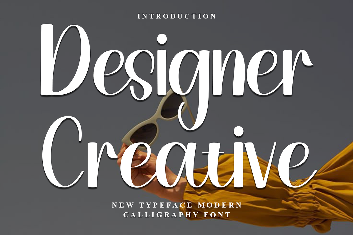 Designer Creative, a Handwritten Font by InermediaSTUDIO (Photo 1 of 8)
