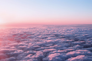 Pink sunset sky with clouds