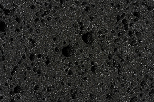 Close-up of black porous sponge with many small holes, an Abstract Photo by ndanko