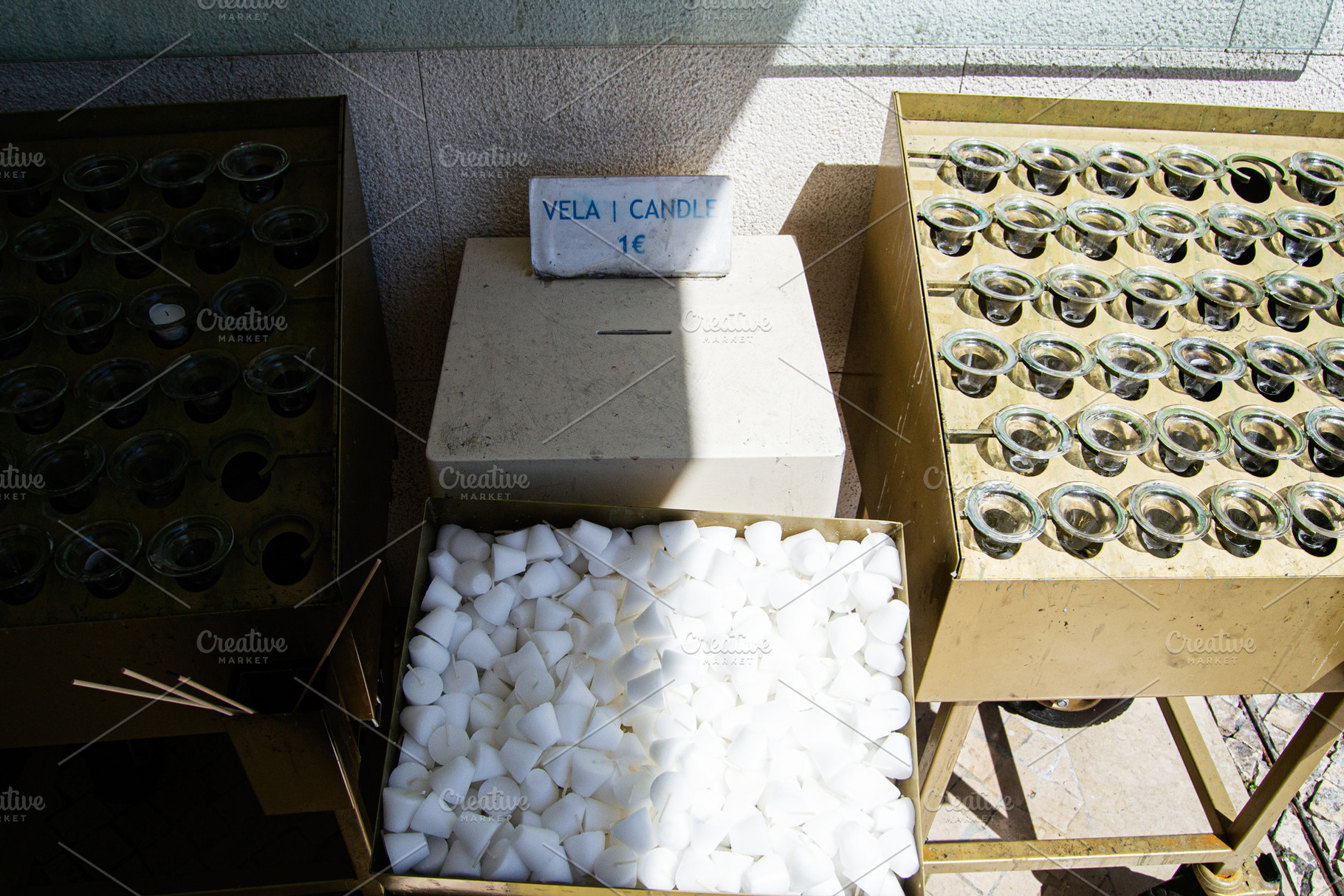 Candles for sale at a religious site in Fatima, Portugal, a Photo by AS photostudio