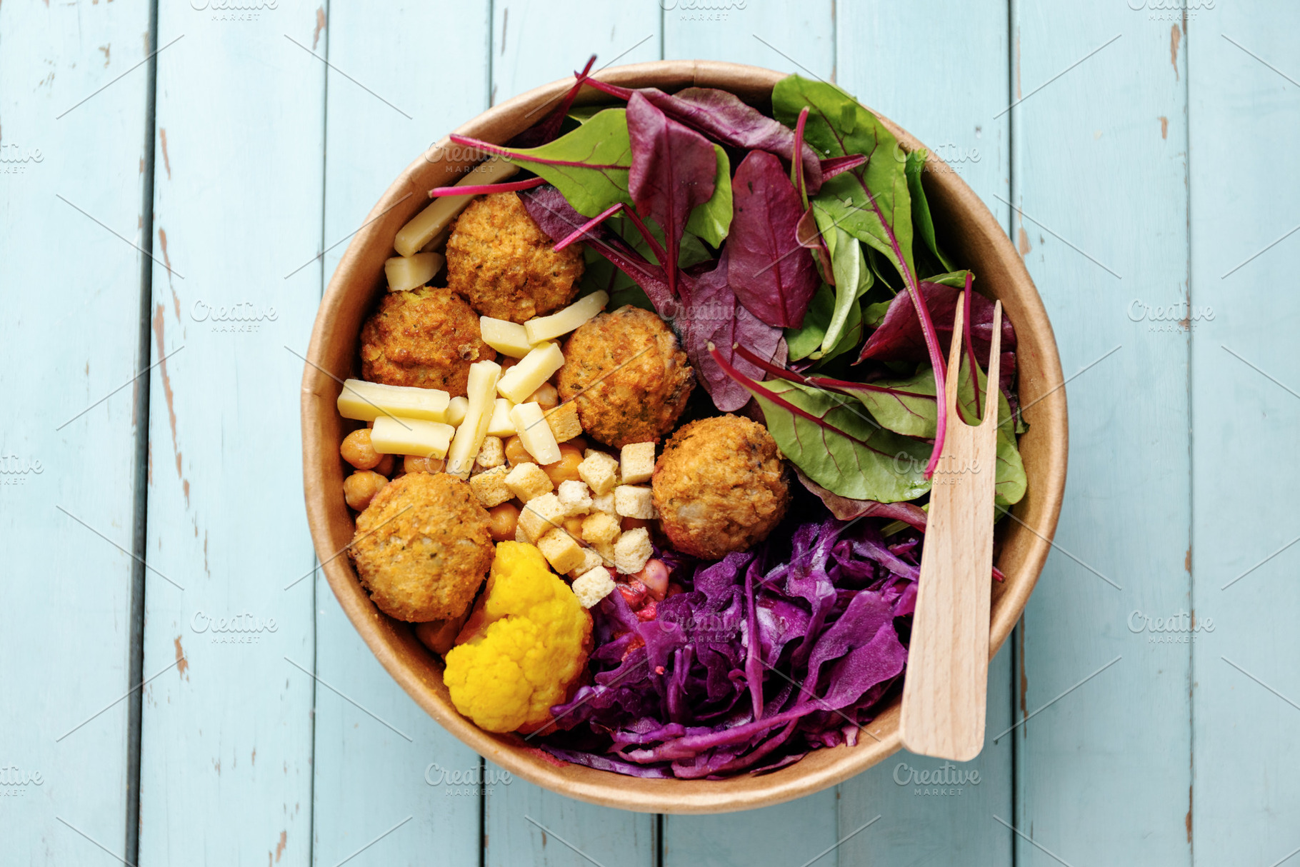Tasty vegan salad with falafel, a Food & Drink Photo by Valeria Art