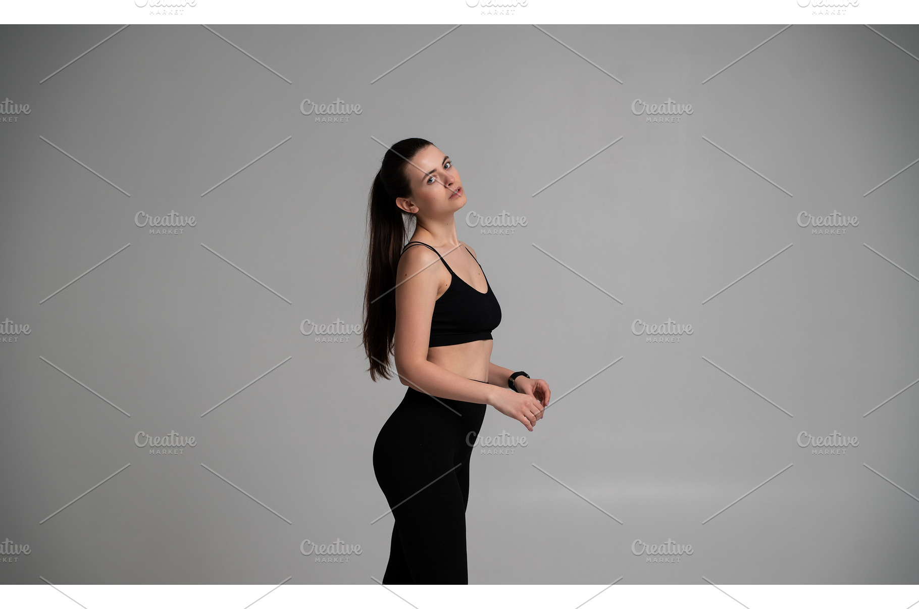 Young woman in black sportswear, a Sports & Recreation Photo by volodymyrshtun13795