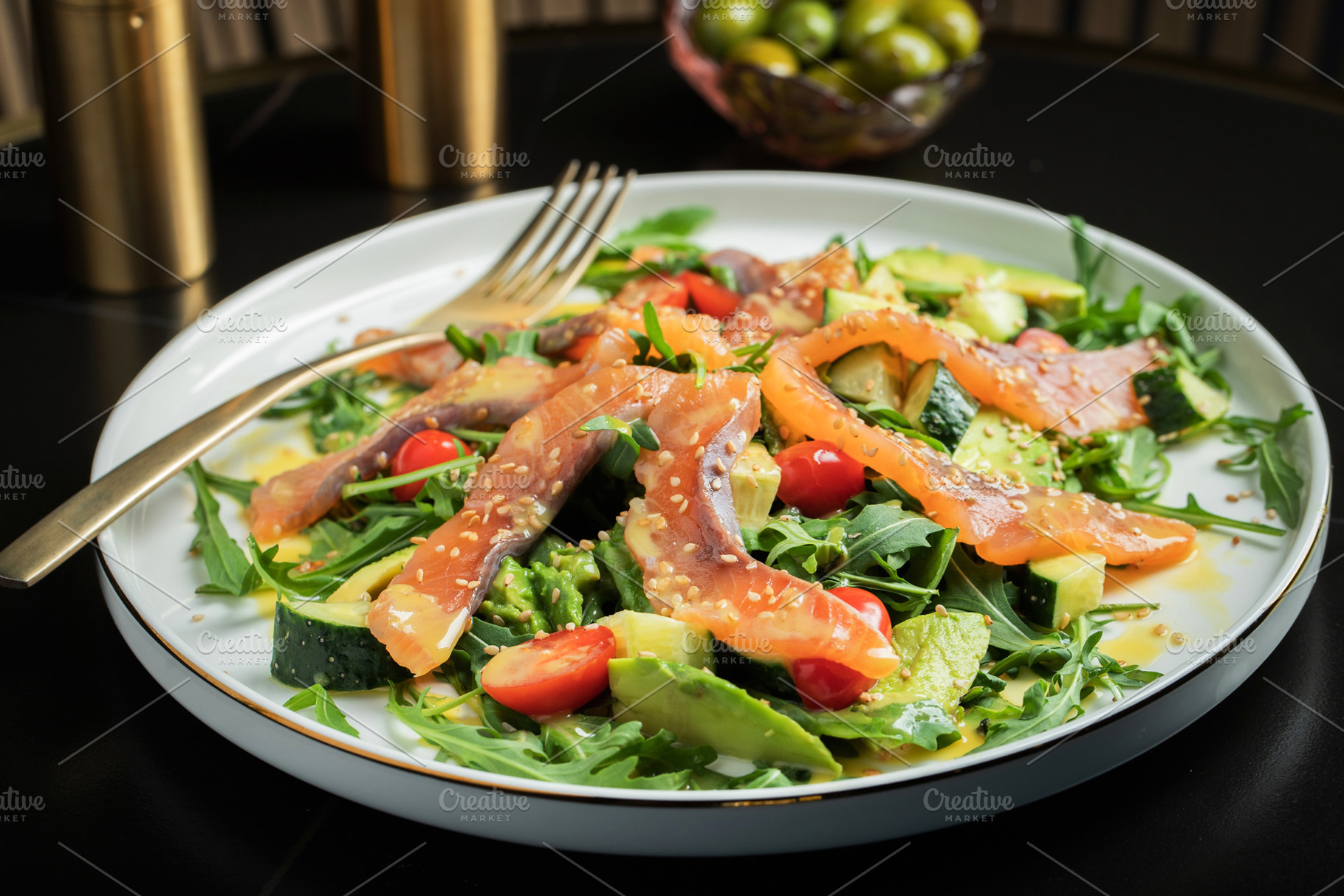 Salad with salted salmon and arugula, a Food & Drink Photo by Budarinphoto