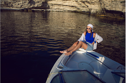 young sexy woman in a blue swimsuit, a Person Photo by SaulichPhoto
