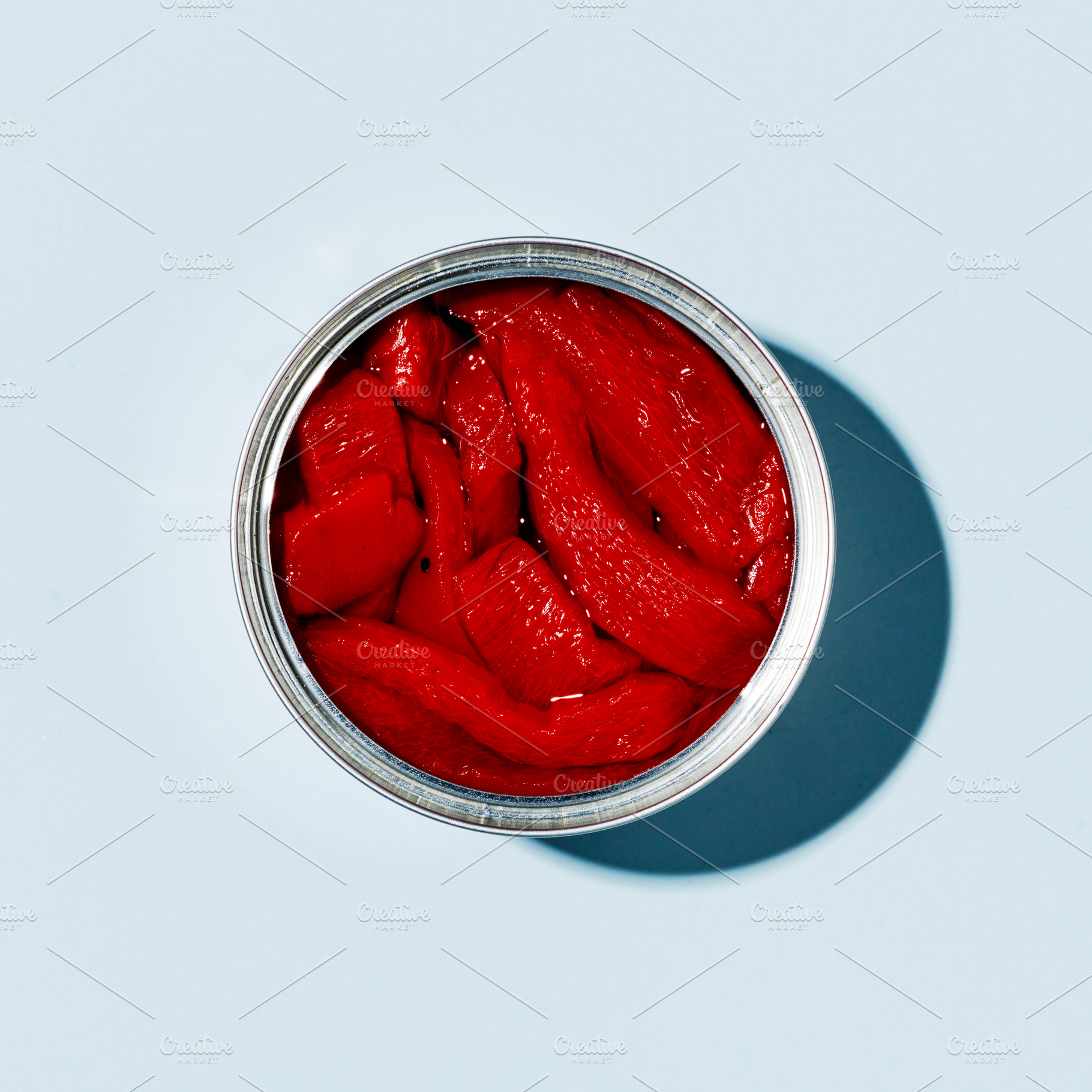 can of tinned roasted bell peppers, a Photo by Nito