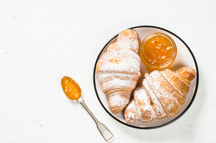 Croissant with jam on white featuring croissant, bakery, and baking, a Food & Drink Photo by Nadia-nb
