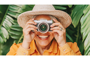 Smiling woman with a camera and, a Nature Photo by Sergey Kotenev