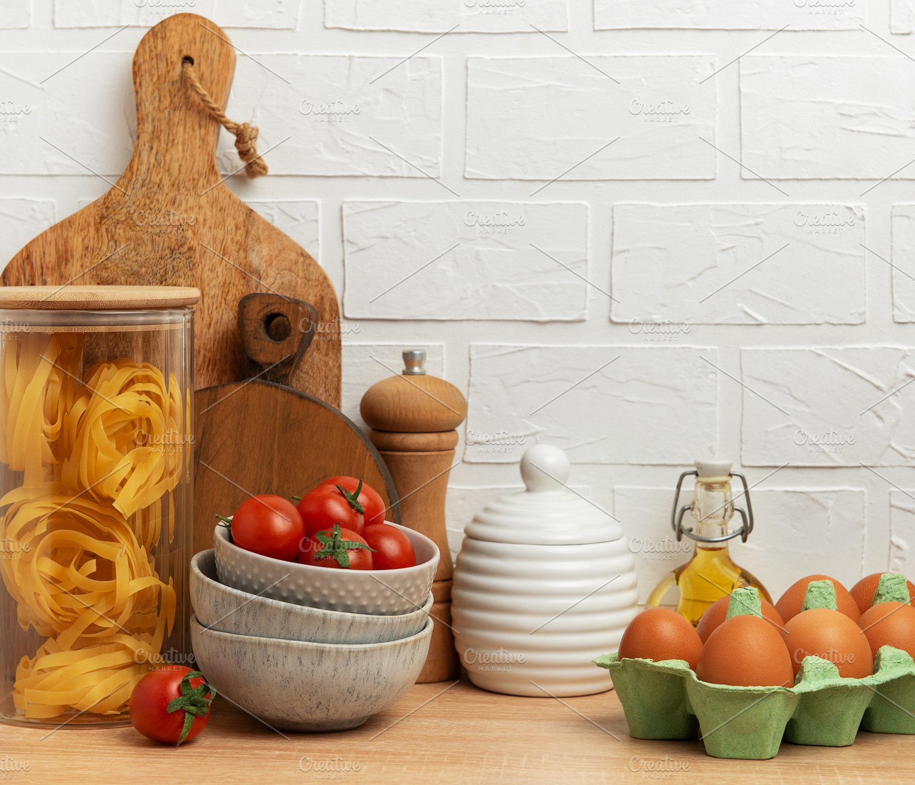 Italian food, cherry tomatoes, pasta, eggs and olive oil creatin, a Food & Drink Photo by Olena Rudo