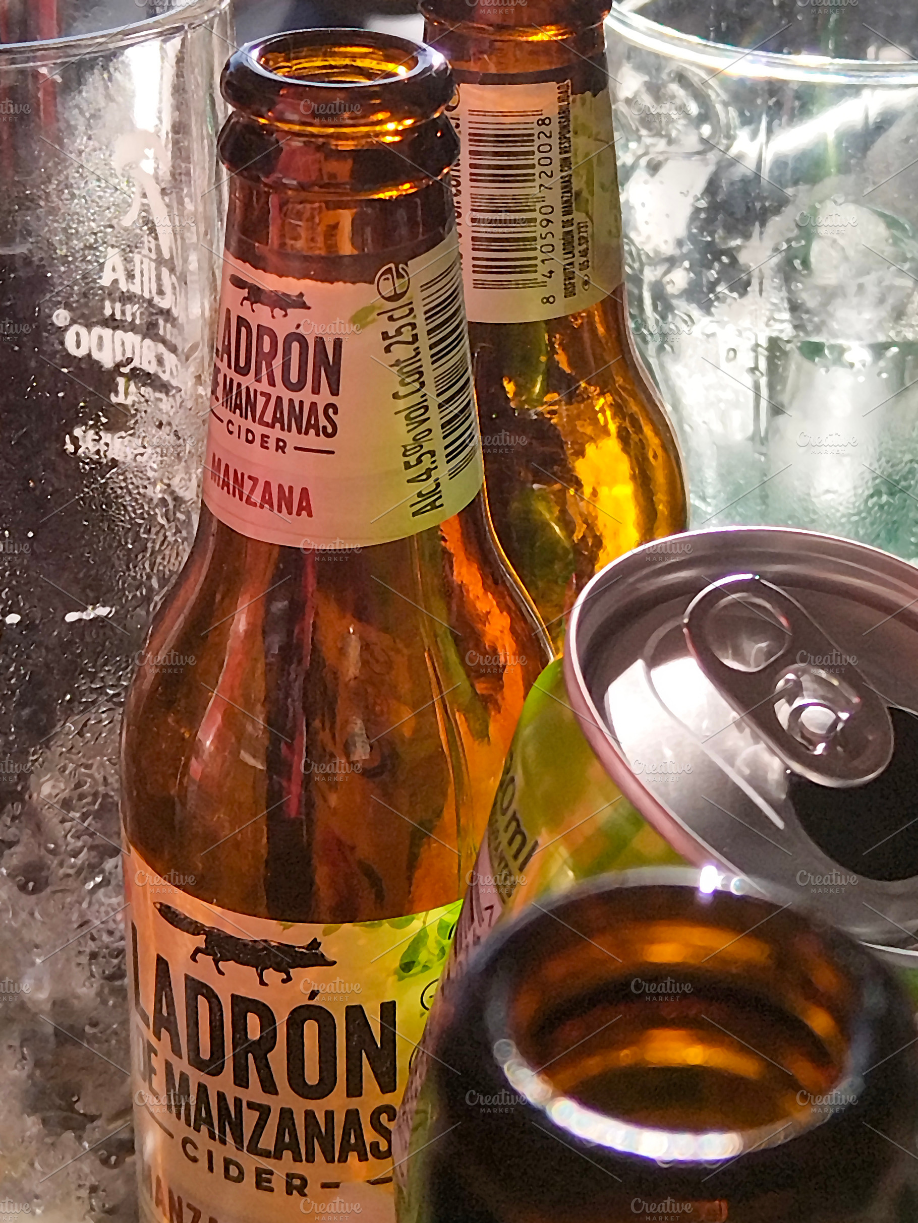 Beer bottles on table after casual gathering, a Food & Drink Photo by DanFLCreativo