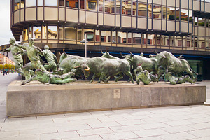 Running bulls monument in Pamplona, a Photo by saiko3p